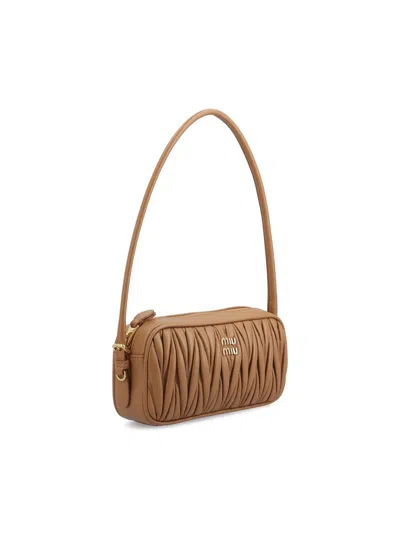 Miu Miu Zipper Handbag In Brown