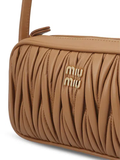 Miu Miu Zipper Handbag In Brown