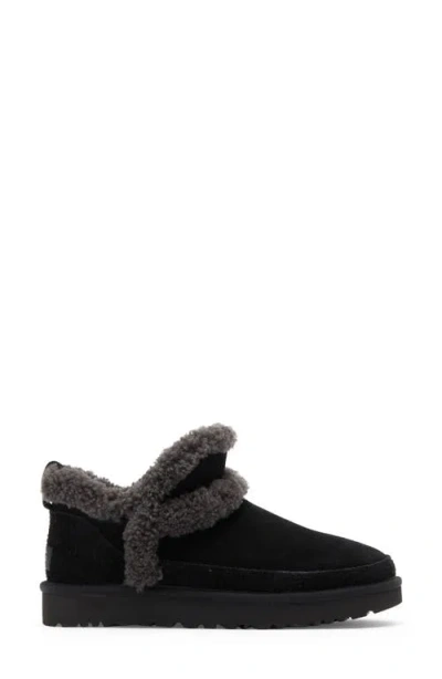 Ugg(r) Classic Ultra Mini Spillseam Genuine Shearling Bootie In Black