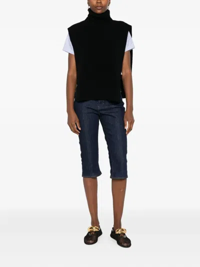 Davantino Turtleneck Sleeveless Wool Sweater In Black