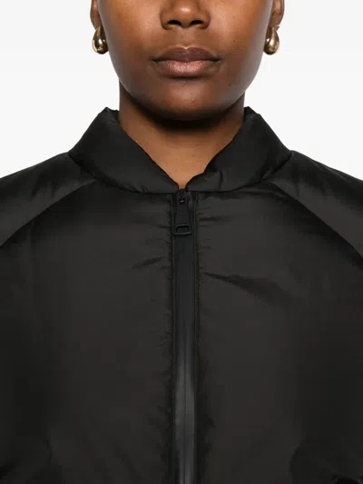 Khrisjoy Quilted Zip-front Jacket In Black