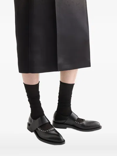 铆钉缀饰高跟鞋