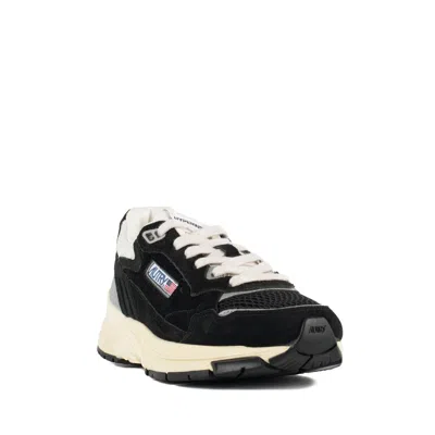 Autry Hyperway Sneakers With Front Lacing And Logo Details In Black