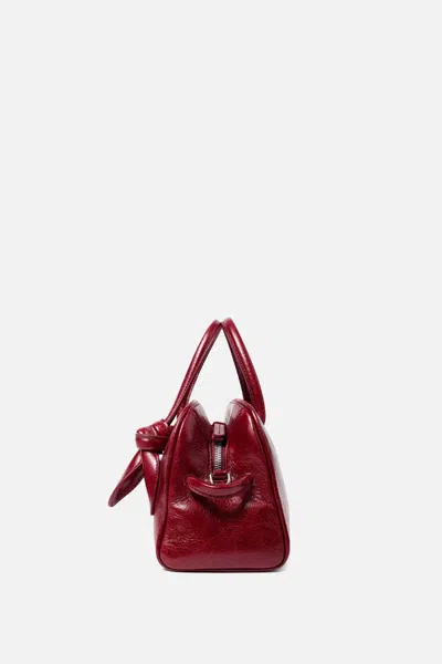Jacquemus Le Petit Tourism In Shiny Vintage-finished Leather Bags In Red
