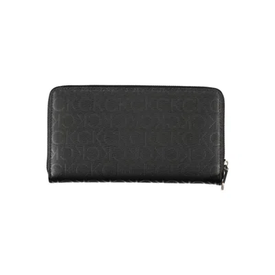 Calvin Klein Sleek Designer Three-compartment Women's Wallet In Black