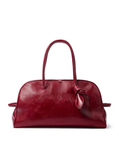 Jacquemus Le Petit Tourism In Shiny Vintage-finished Leather Bags In Red