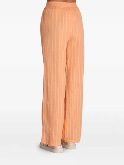 Devotion Striped Cotton Trousers In Orange