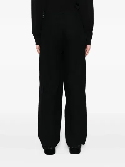 Devoa Pleated-panel Trousers In Blue