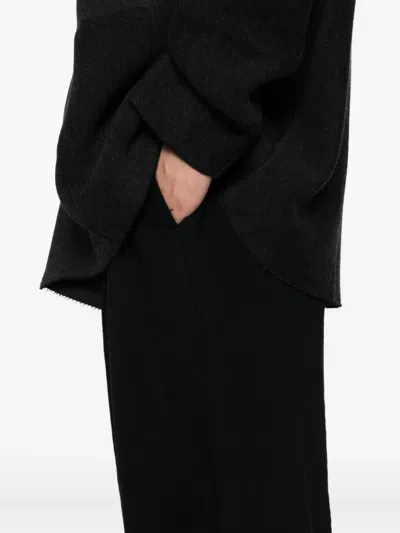 Devoa Pleated-panel Trousers In Blue