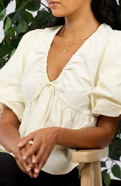 Athra Luxe Cubic Zirconia Bow Initial Pendant Necklace In Gold