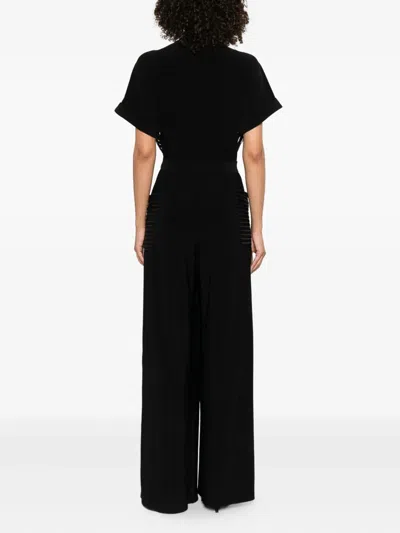 Norma Kamali Geralyn Belted Paneled Jersey And Mesh Jumpsuit In Black