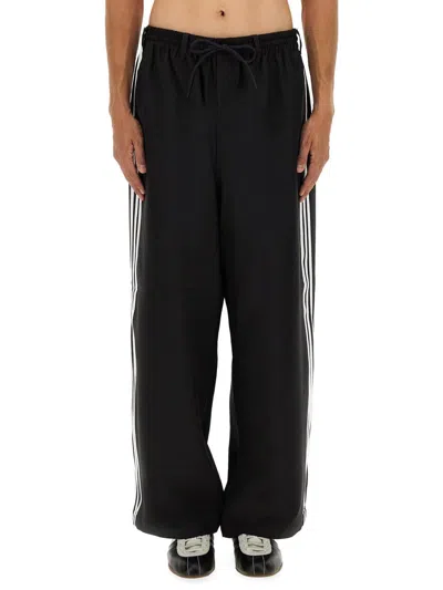 Y-3 Loose Black Jogger Pants With Adjustable Drawstring And Striped Details In Black