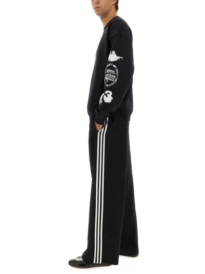 Y-3 Loose Black Jogger Pants With Adjustable Drawstring And Striped Details In Black