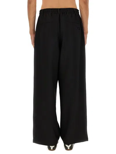 Y-3 Loose Black Jogger Pants With Adjustable Drawstring And Striped Details In Black