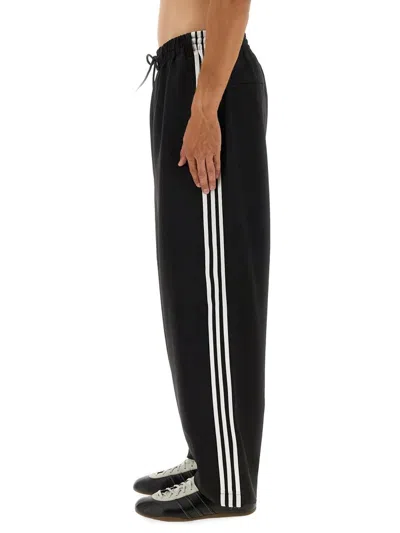 Y-3 Loose Black Jogger Pants With Adjustable Drawstring And Striped Details In Black