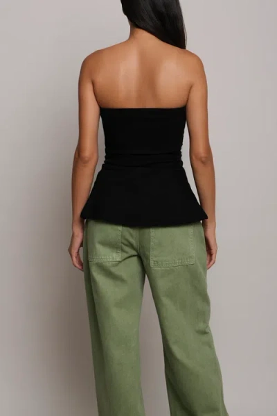 Tt Studios Luna Peplum Top In Black