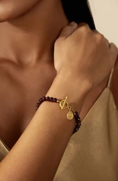 Satya Jewelry Garnet Lotus Toggle Bracelet In Gold