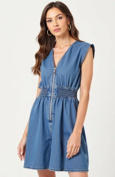 Modenaire Denim Romper With Cap Sleeves Smocked Waist And Front Zip Closure In Blue