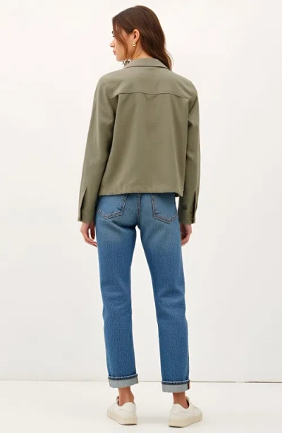 Modenaire Cropped Utility Jacket With Snap Buttons And Adjustable Drawstring Hem In Green