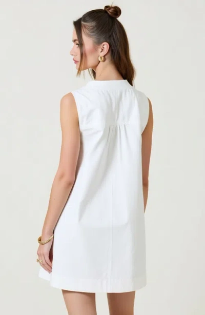 Modenaire Sleeveless Mini Dress With Zip Front And Patch Pockets In White