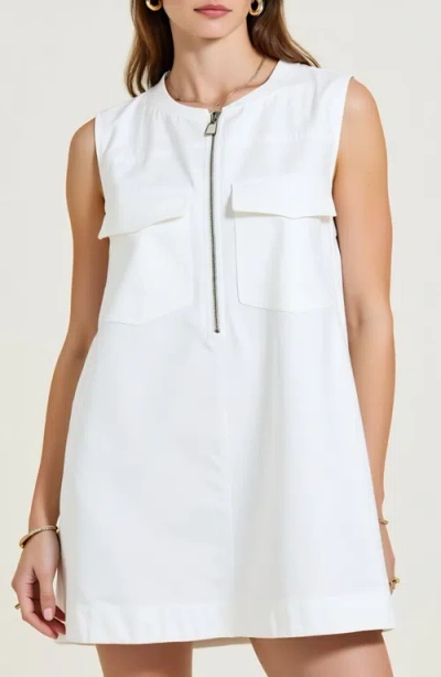 Modenaire Sleeveless Mini Dress With Zip Front And Patch Pockets In White