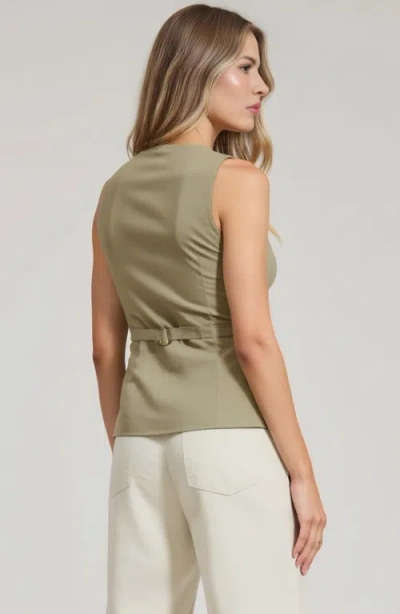 Modenaire Tailored Button Front Vest With Flap Pockets And Notched Hem In Green