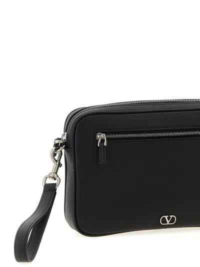 Valentino Garavani Clutch Bag With External Pocket And Wrist Strap In Black