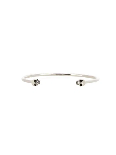 Alexander Mcqueen Twin Skull Bracelet In Metallic