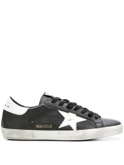 Golden Goose 'super-star' Black Low Top Sneakers With Logo Patch And Suede Details In Leather Man In Black