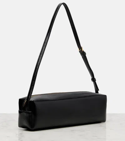 Khaite Kye Glossed-leather Shoulder Bag In Black