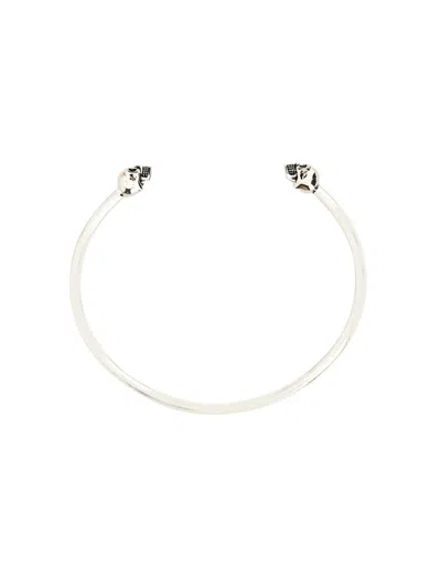 Alexander Mcqueen Twin Skull Bracelet In Metallic