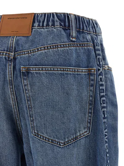 Alexander Wang Embossed Logo Jeans In Blue