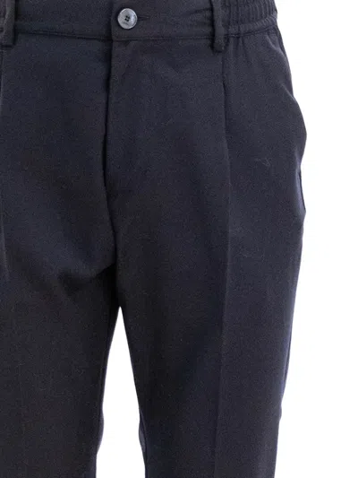 Cruna Pleated-front Trousers In Black