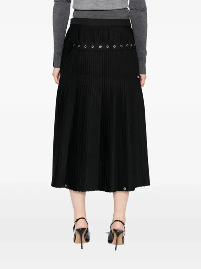 褶饰翻褶半身裙