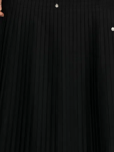 褶饰翻褶半身裙