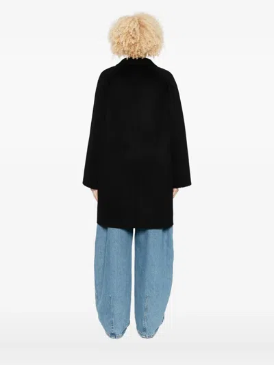 The Dynamis Studio Oxford Button Wool Coat In Black