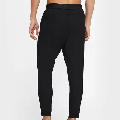 Nike Solo Swoosh Straight-leg Logo-embroidered Cotton-blend Jersey Sweatpants In Black