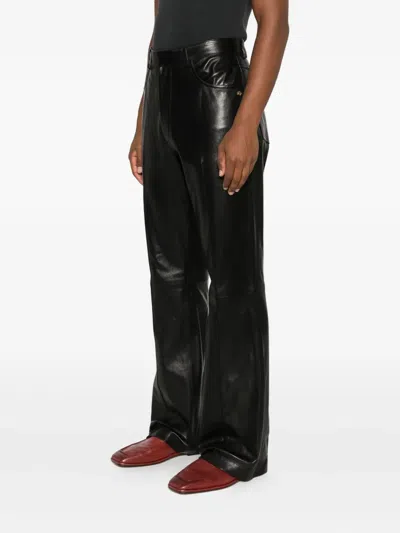 Amiri Leather Bootcut Trousers In Black