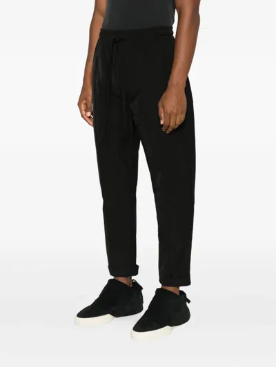 Hamza Elastic-waist Trousers In Black