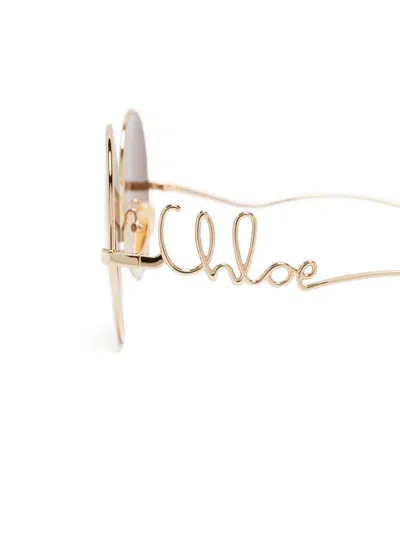 Chloé Round Frame Sunglasses Featuring Curved Temples In Gold