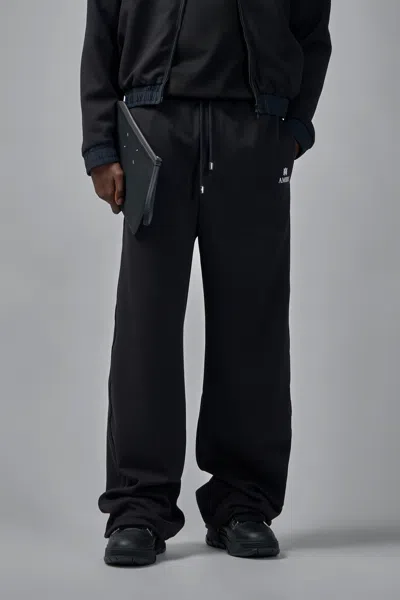 Amiri Logo Print Track Pants In Black