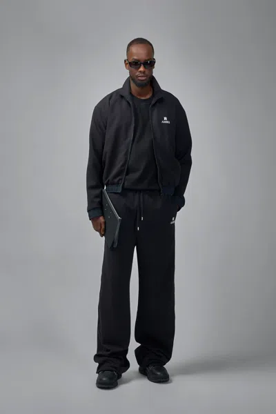 Amiri Logo Print Track Pants In Black