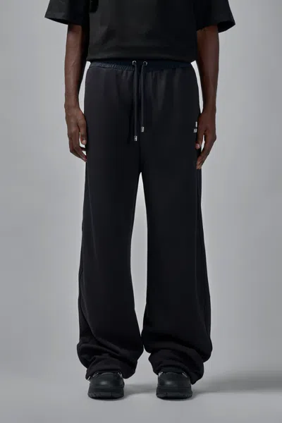 Amiri Logo Print Track Pants In Black