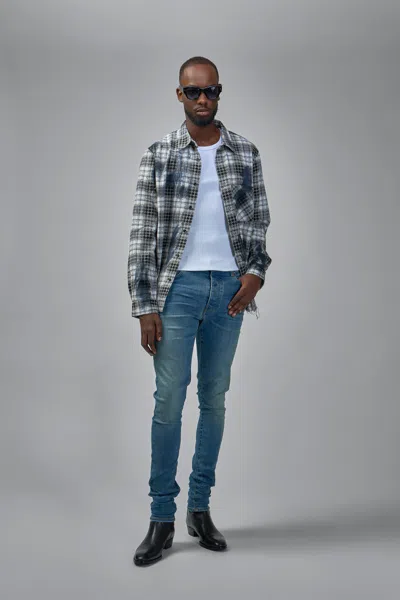 Amiri Stack Jeans In Burgundy