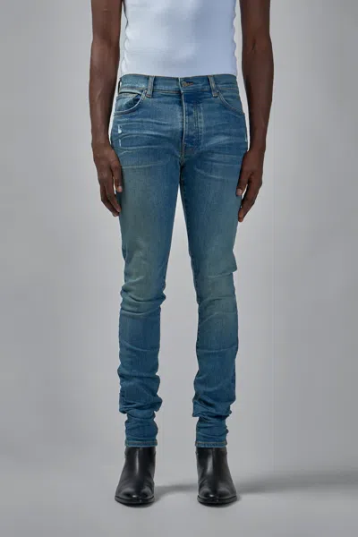 Amiri Stack Jeans In Burgundy