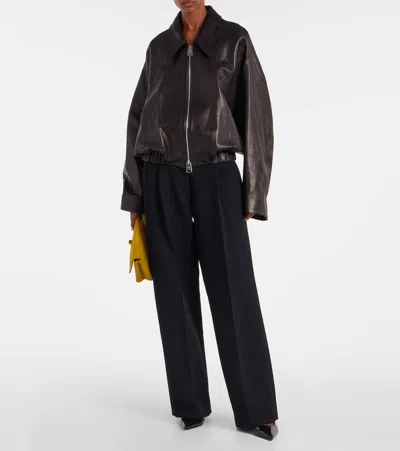 Khaite Teyana Pleated Woven Wide-leg Pants In Black