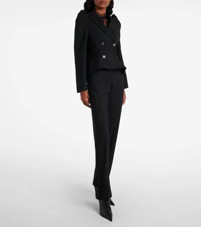 Alexander Mcqueen Tailored Wool Trousers Featuring Flared Hem In Black