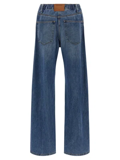Alexander Wang Embossed Logo Jeans In Blue