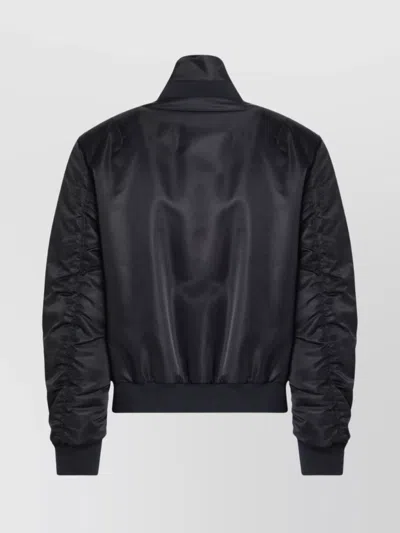 Alexander Mcqueen Mcqueen Technical Crop Bomber Jacket In Black