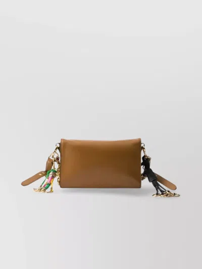 Prada Soft Sound Small Leather Shoulder Bag With Charms In Brown